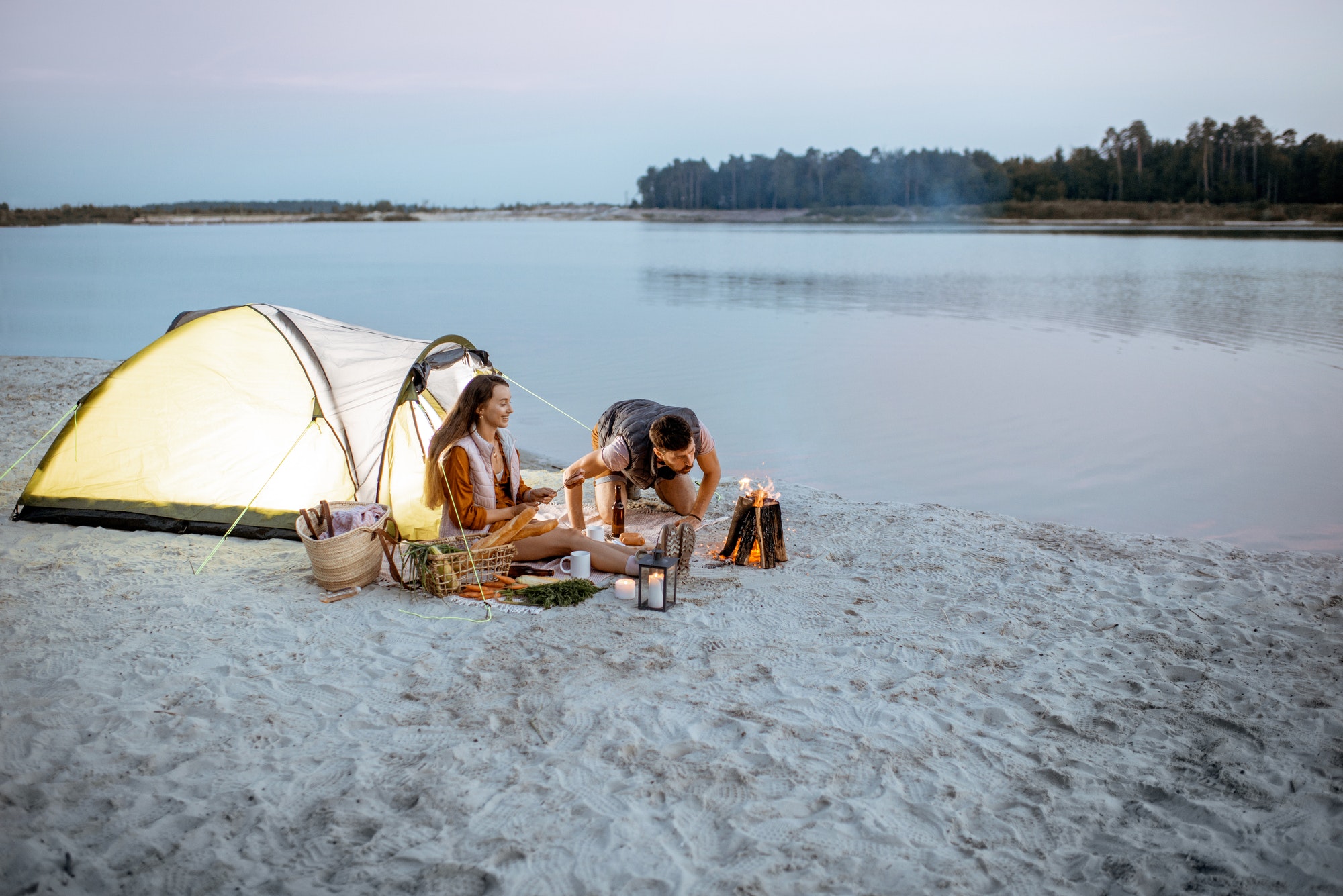 Couple at the campsite on the beach